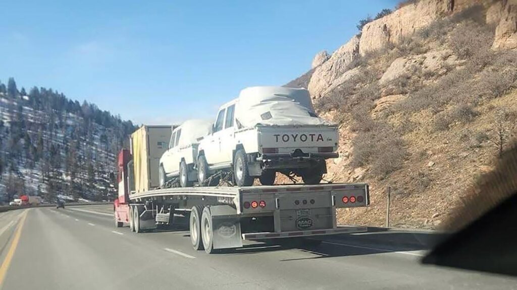 Two rare 79 Series Toyota Land Cruisers spotted near Laramie on I-80 on the back of a flatbed truck